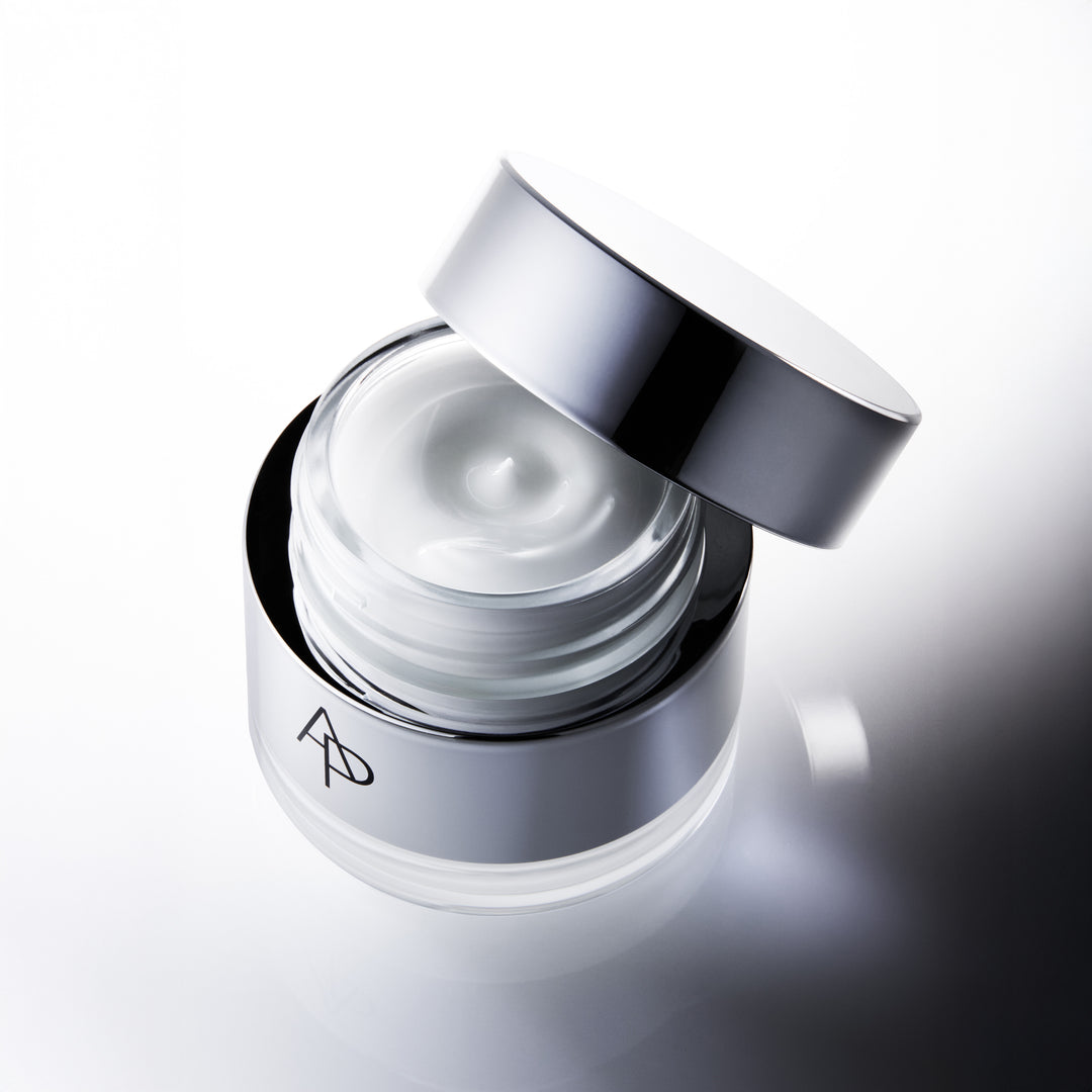 AP Beauty Rejuvenating Treatment M.D. Cream, stylized product shot on gradient silver background