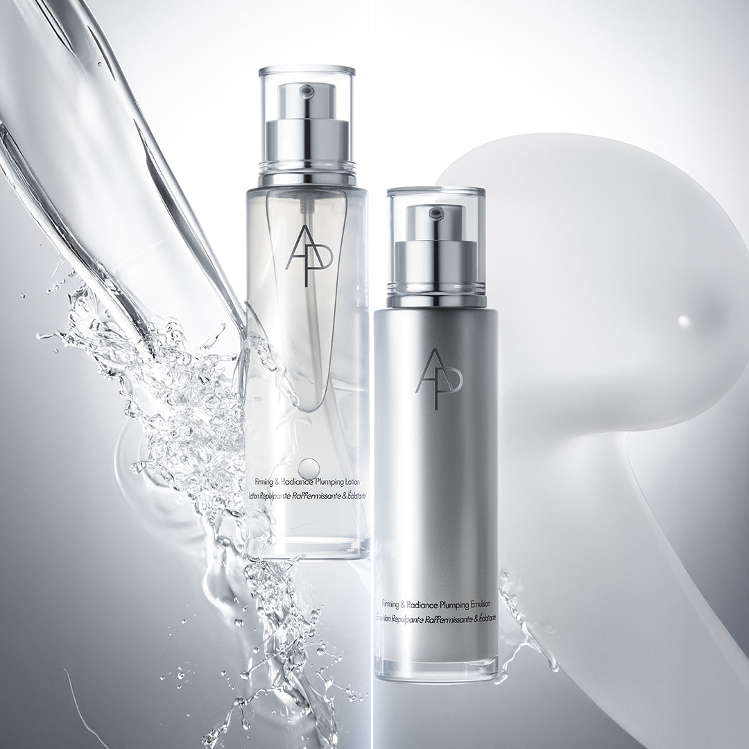 Stylized shot of Plumping Lotion and Emulsion