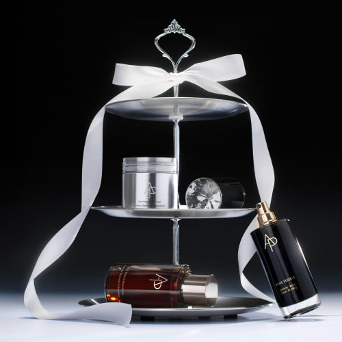 AP Beauty Holiday Bundle, products on tiered tray with ribbon