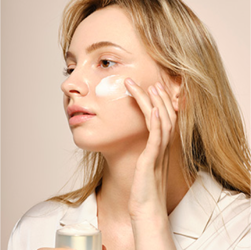 Model applying moisturizer