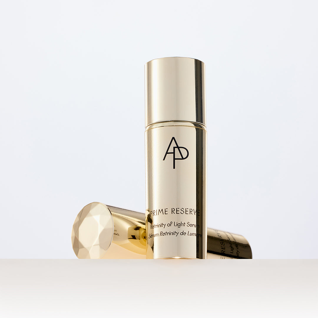 AP Beauty, PRIME RESERVE Retrinity of Light Serum on white background