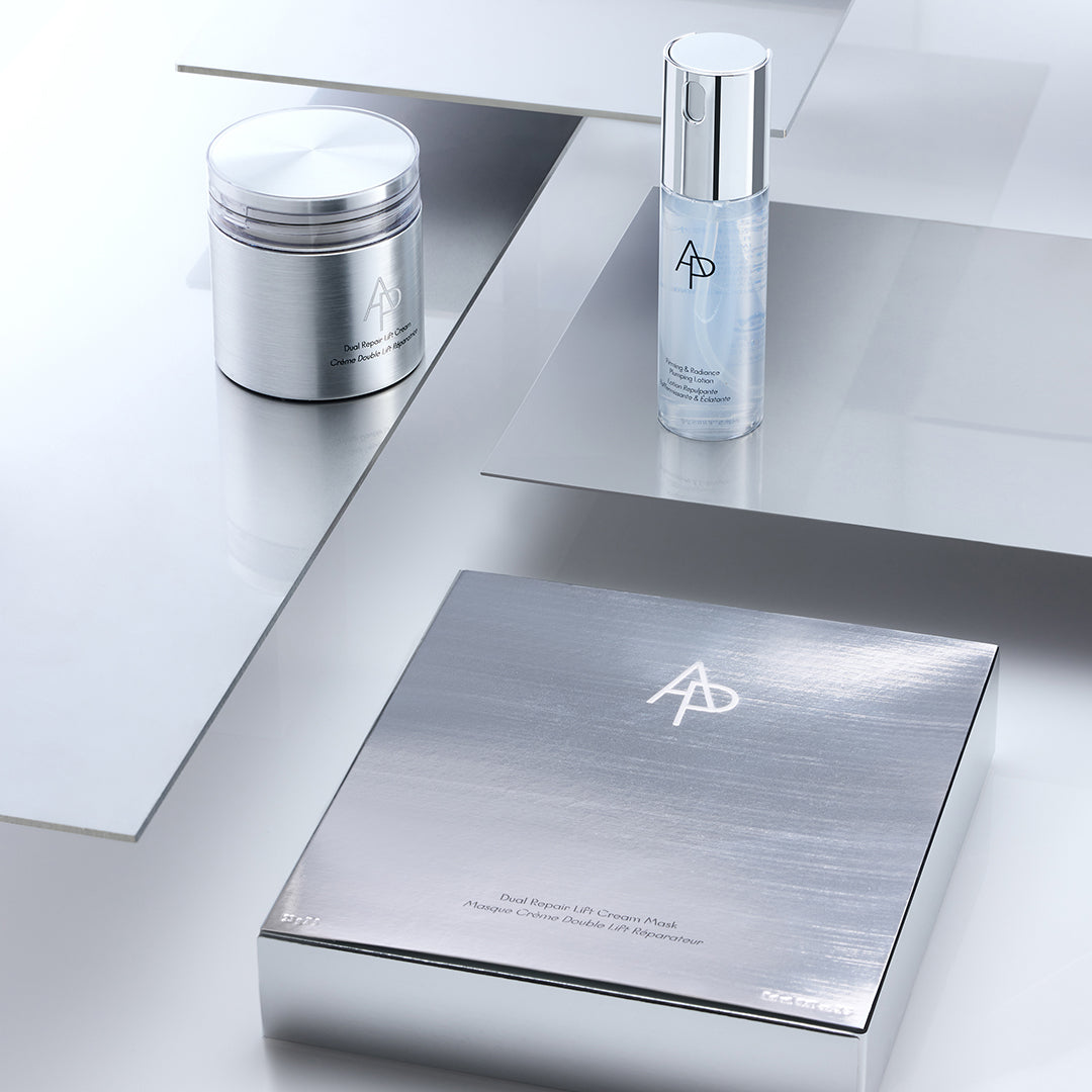 AP Beauty, Dual Repair Lift Cream Set, components laid out on silver surface