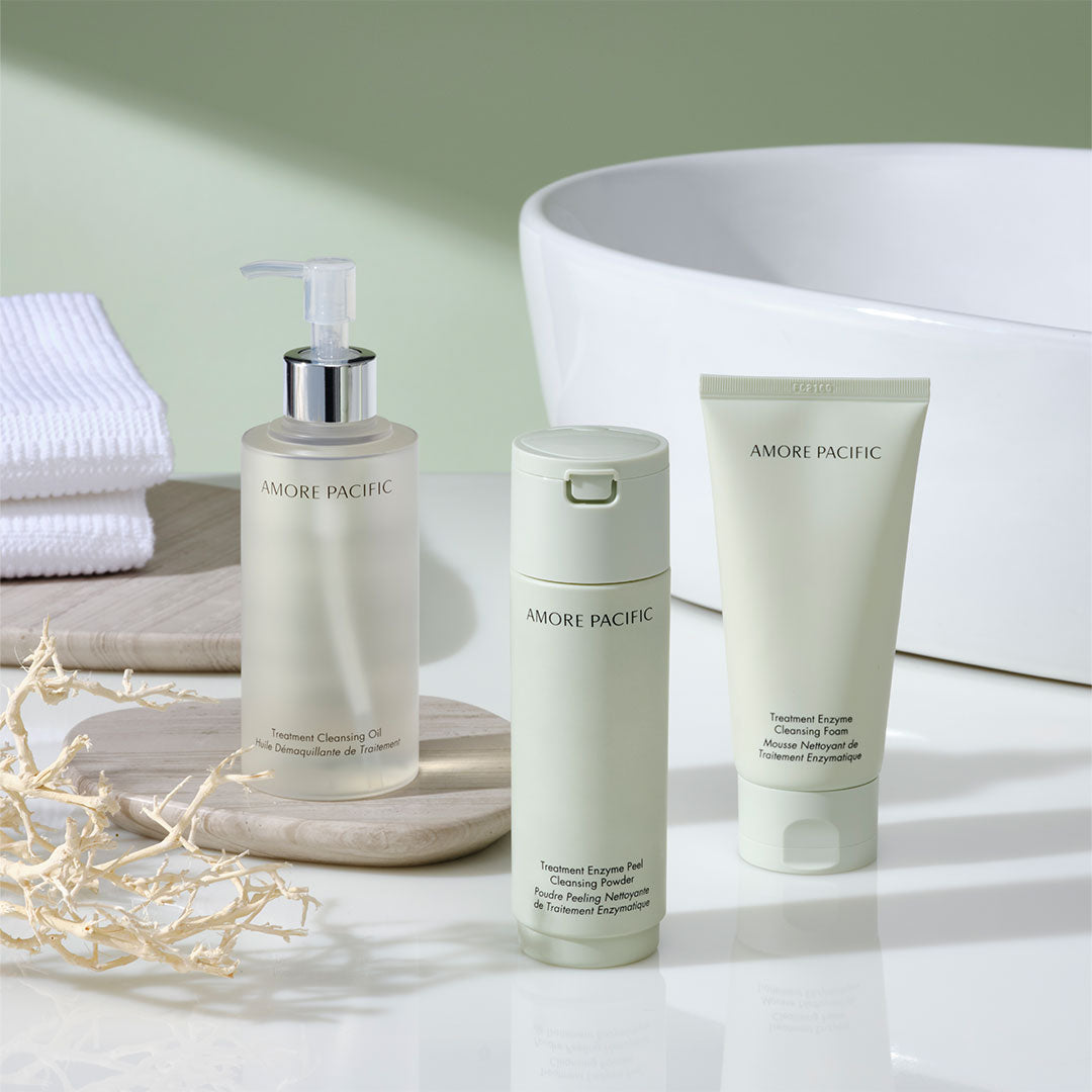 three cleanser skincare products on counter