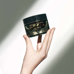 Model holding Prime Reserve Cream