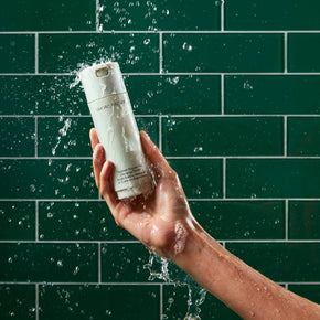 Model holding cleanser with water